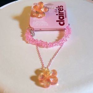Pretty iridescent pink ring, bracelet, and necklace set for a young girl.